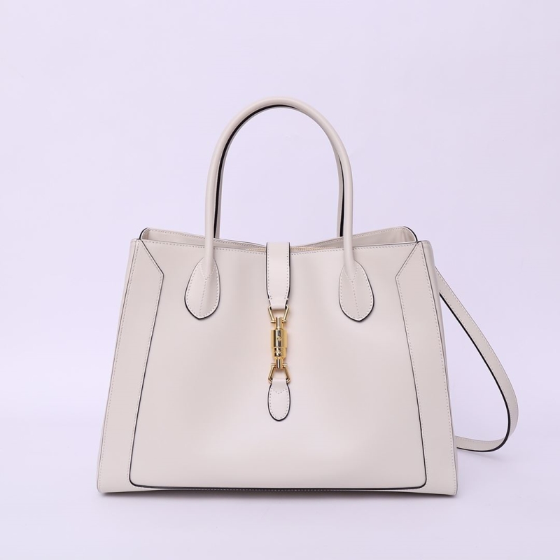 G*u*i top handle bags